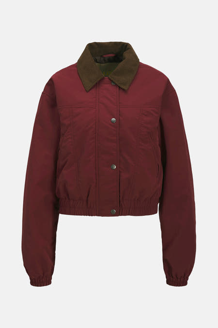 Manteau court rouge de JJXX avec un col en corduroy marron et une fermeture à boutons.