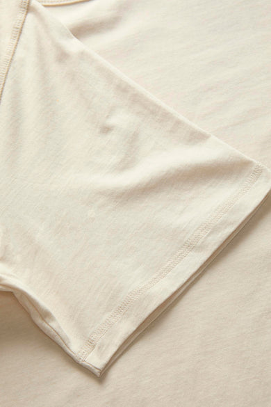 T-shirt beige à manches courtes de PREMIUM BLUE par JACK & JONES, surpiqûre des manches avec des points.