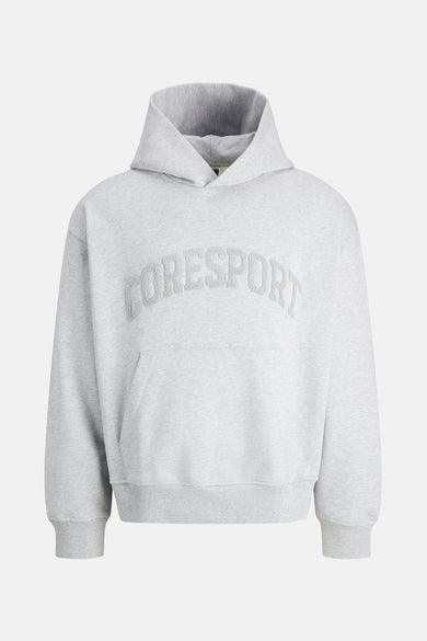 Pull-over gris avec capuche de CORE BY JACK & JONES, avec logo CORESPORT sur la poitrine et poche kangourou.