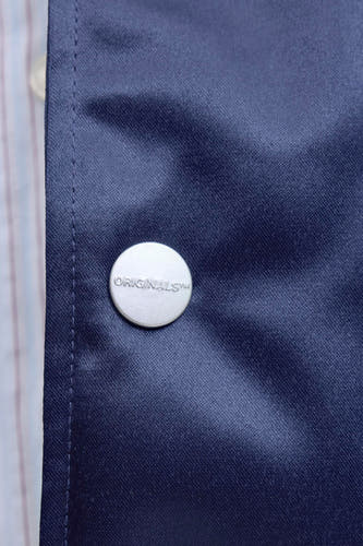 Veste bleue d'ORIGINALS BY JACK & JONES avec bouton pression argenté et nom de marque en relief.