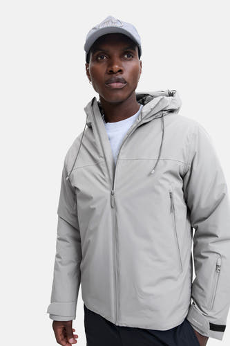 Manteau gris court de CORE BY JACK & JONES, avec capuche et fermetures éclair visibles sur l'avant.