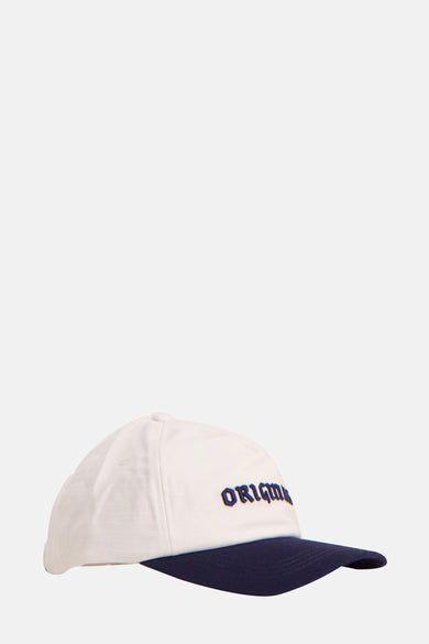 Casquette bleue d'ACCESSORIES BY JACK & JONES, avec une couronne blanche et du texte brodé à l'avant.
