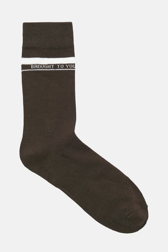 Chaussettes brunes d'ACCESSORIES BY JACK & JONES, avec une bande blanche et le texte "Brought to you".