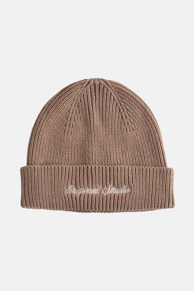 Chapeau beige d'ACCESSORIES BY JACK & JONES avec texture tricotée et détail de logo.