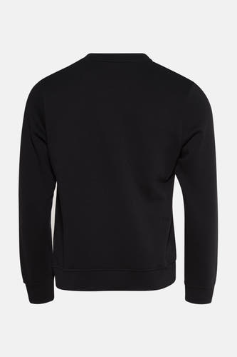 Gilet noir de CORE BY JACK & JONES, avec une impression sur l'arrière, des manches longues et un col rond.