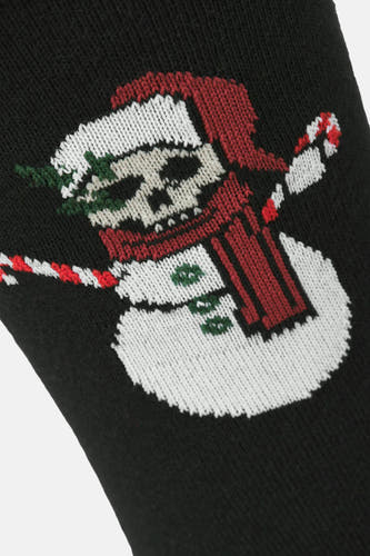 Chaussettes noires d'ACCESSORIES BY JACK & JONES avec une impression de bonhomme de neige graphique et un crâne.