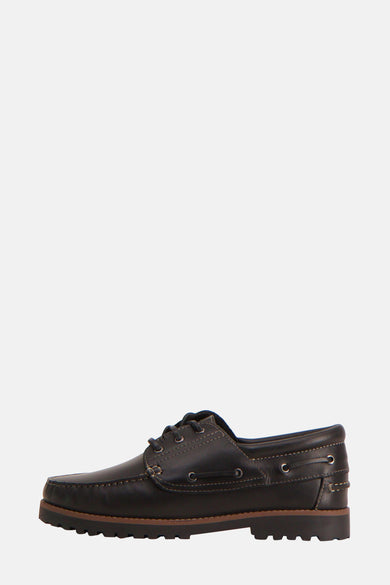 Bottines noires d'ACCESSORIES BY JACK & JONES, avec des lacets et une semelle brune, en vue de face.