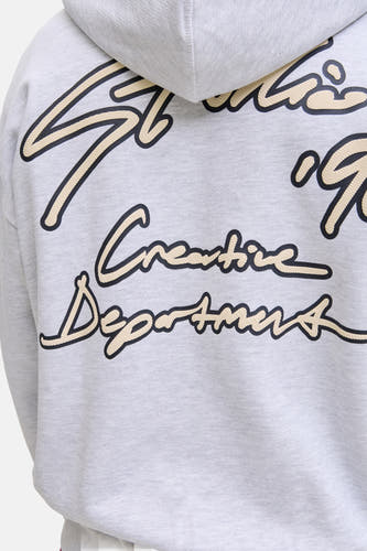 Gilet gris avec capuche d'ORIGINALS BY JACK & JONES, avec des lettres scriptuelles décoratives sur le dos.