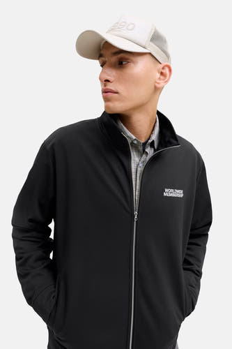 Gilet noir de CORE BY JACK & JONES, avec fermeture éclair et l'inscription "WORLDWIDE MEMBERSHIP" visible.