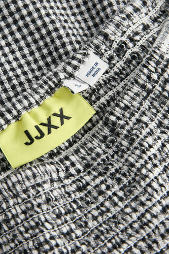 Jupe multicolore de JJXX, avec un motif à carreaux noir et blanc fin et des détails élastiques.