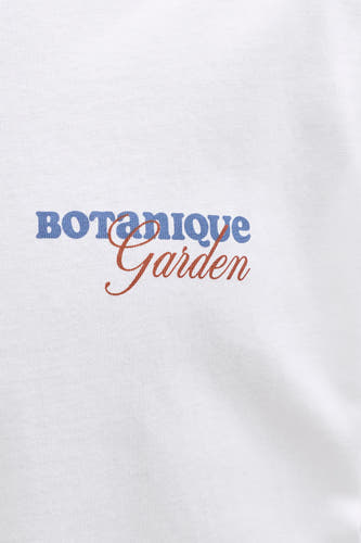T-shirt blanc de ORIGINALS BY JACK & JONES, avec inscription "Botanique Garden" en bleu et marron.