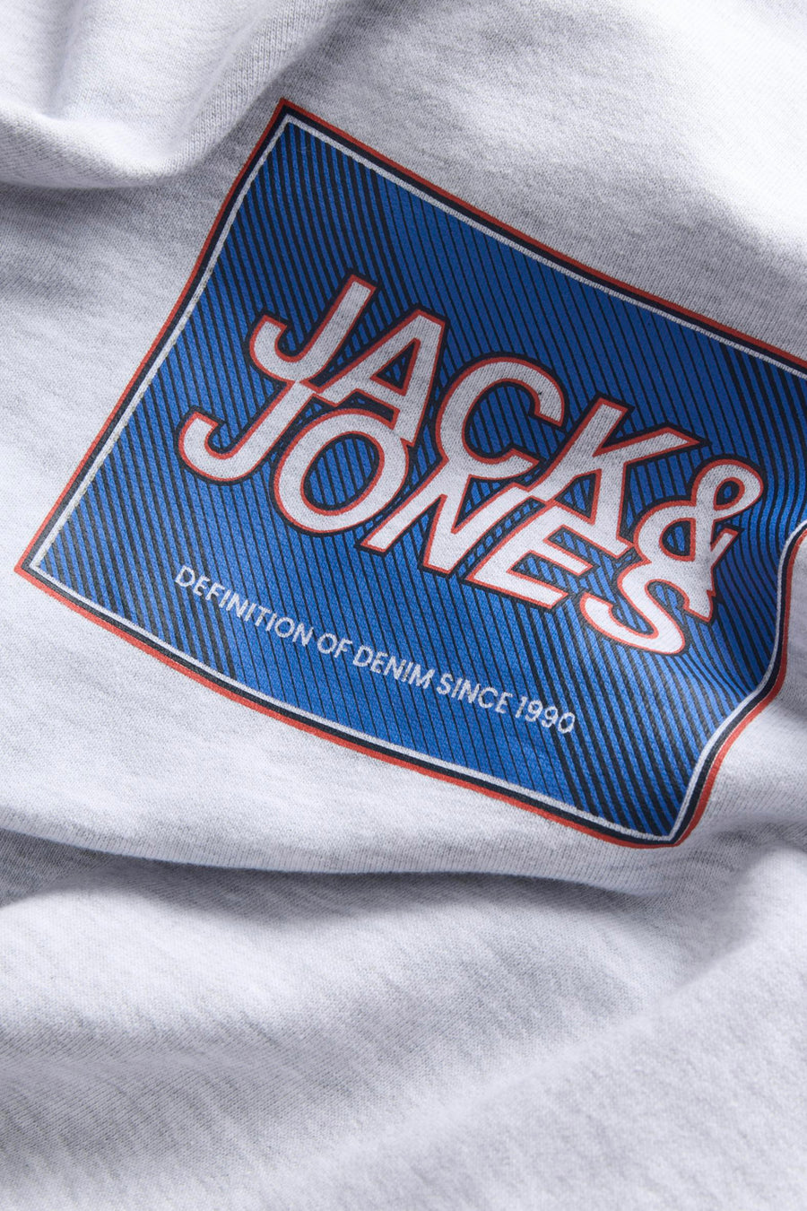 Witte sweater van CORE by JACK & JONES, met een opvallende grafische print.
