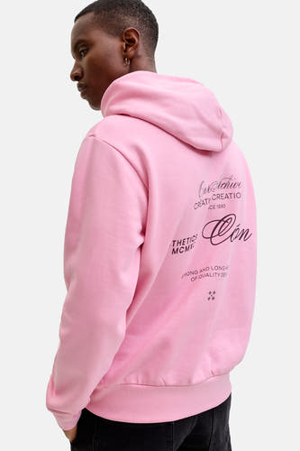 Gilet rose avec capuche d'ORIGINALS BY JACK & JONES, avec des inscriptions noires sur le dos.
