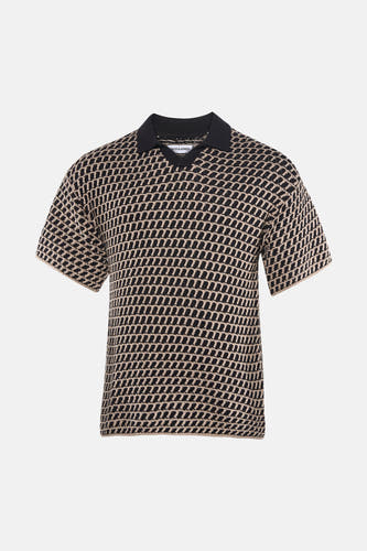 Polo multicolore à manches courtes de PREMIUM by JACK & JONES, avec un motif géométrique frappant.
