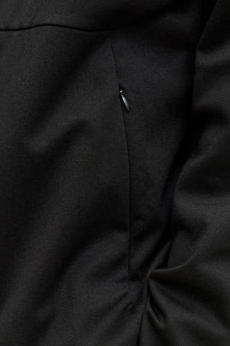 Gilet noir de CORE BY JACK & JONES, avec des plis subtils et une fermeture éclair cachée.