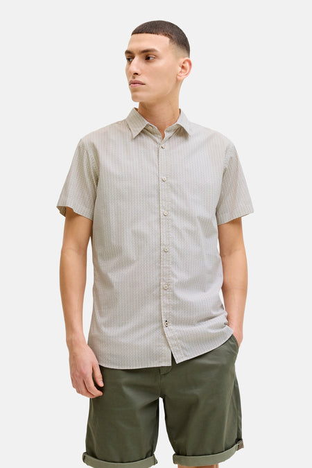 Chemise beige à manches courtes de PREMIUM by JACK & JONES, ornée d'un motif géométrique discret.