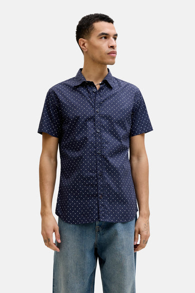 Chemise bleue à manches courtes de PREMIUM by JACK & JONES, avec un motif subtil et un col en nacre.