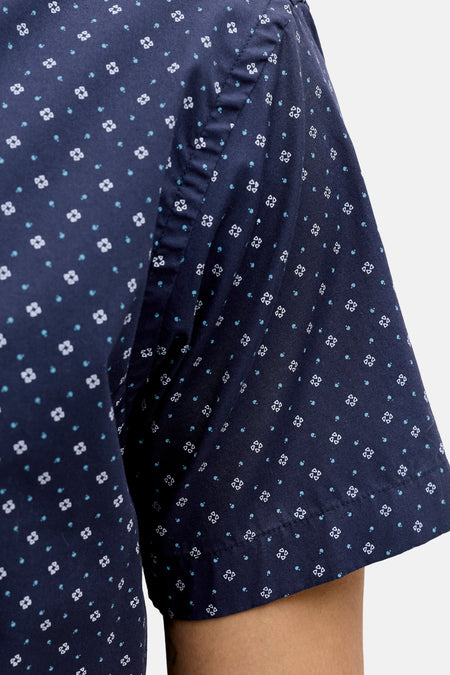 Chemise bleue à manches courtes de PREMIUM by JACK & JONES, avec un motif de fines fleurs et de pois.