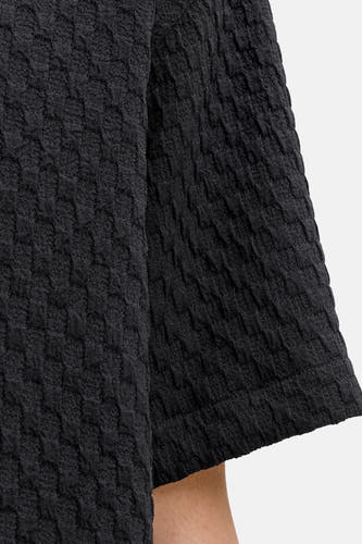 Chemise noire de CORE BY JACK & JONES, à manches courtes et à la surface texturée.