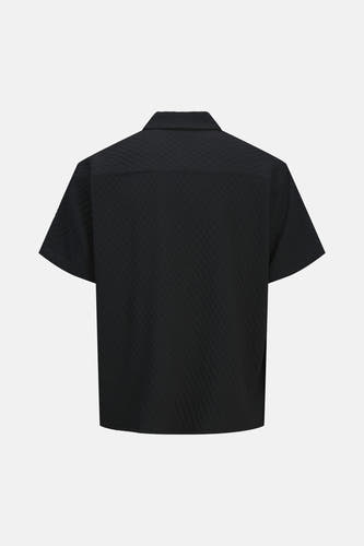 Chemise noire à manches courtes de CORE BY JACK & JONES, avec une texture subtile.