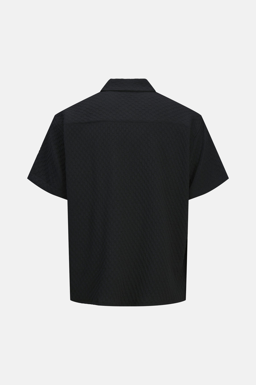 Chemise noire à manches courtes de CORE BY JACK & JONES, avec une texture subtile.