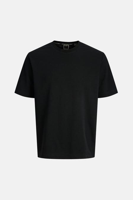 T-shirt noir à manches courtes de CORE BY JACK & JONES, design uni sur fond uni.