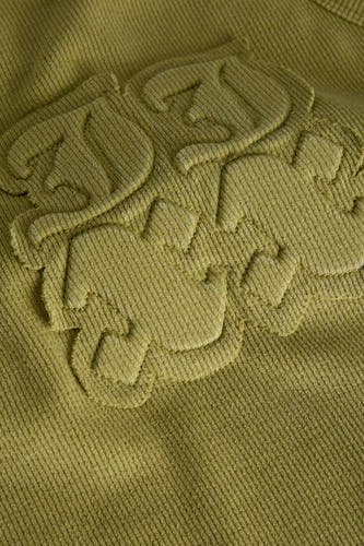 T-shirt vert de JJXX, avec une texture tissée et un logo en relief sur la poitrine.