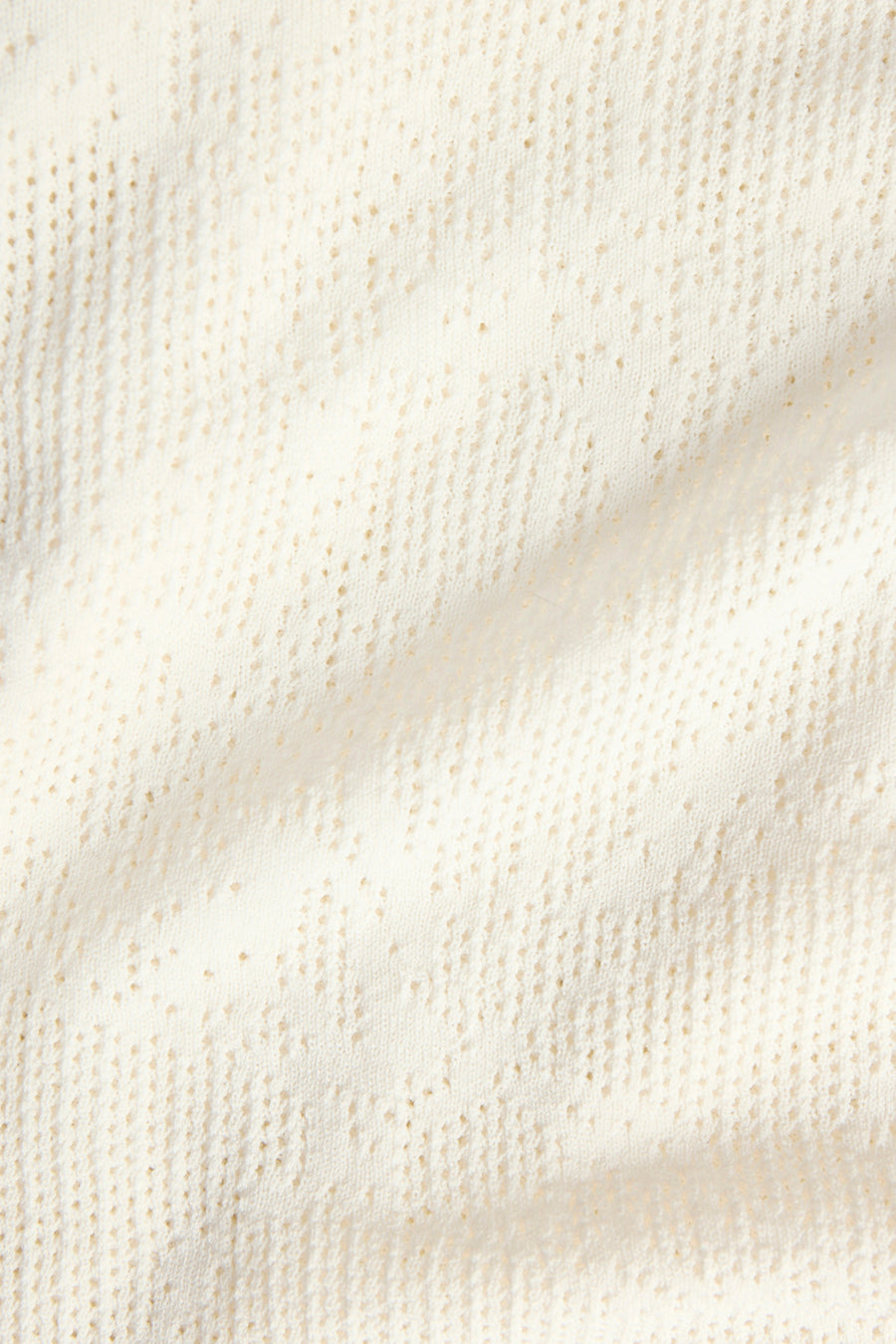 Jupe blanche JJXX avec un motif ajour fin en maille et des plis subtils.