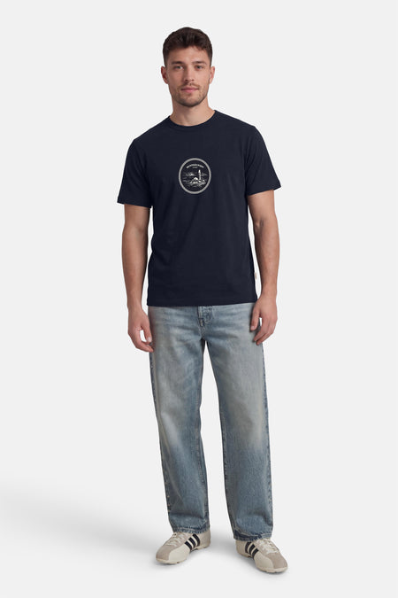 T-shirt bleu à manches courtes de ORIGINALS BY JACK & JONES, avec un imprimé rond sur la poitrine.