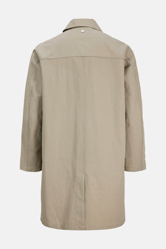 Manteau court beige de PREMIUM by JACK & JONES, avec un col classique et une fente discrète à l'arrière.