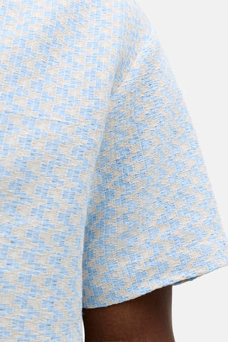 Chemise bleue à manches courtes de ORIGINALS BY JACK & JONES, avec un motif à carreaux et une texture tissée.