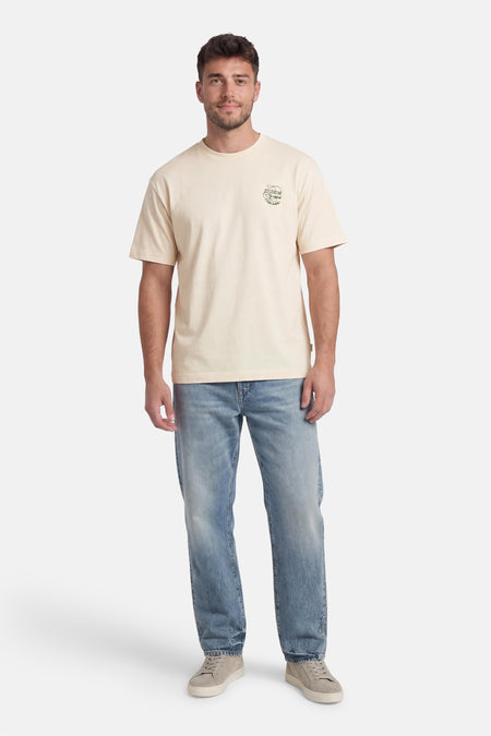 T-shirt écru à manches courtes de ORIGINALS by JACK & JONES, avec un petit imprimé sur la poitrine, à combiner avec un jean et des baskets.