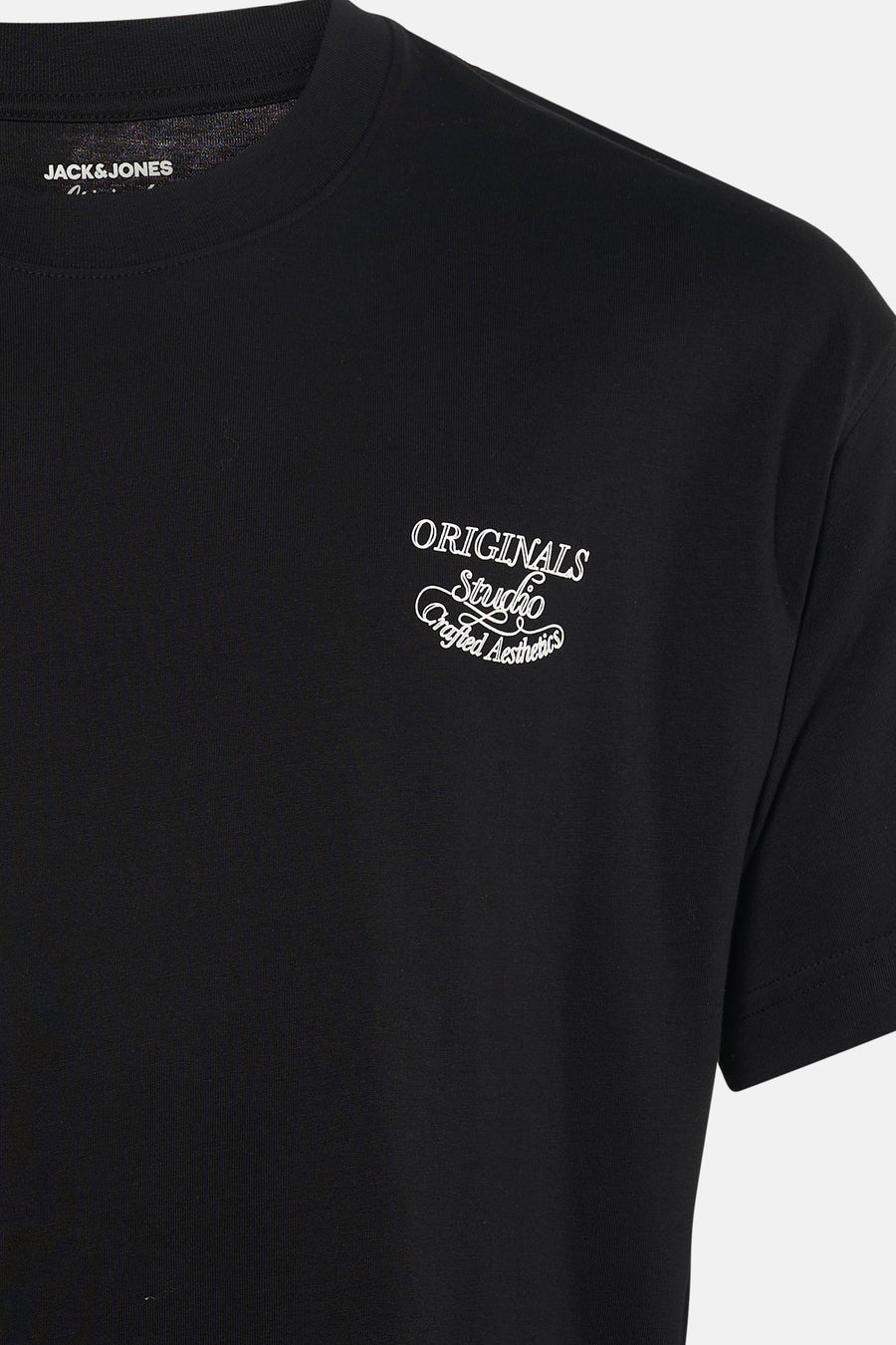 T-shirt noir à manches courtes de ORIGINALS BY JACK & JONES, avec imprimé blanc 'Originals Studio Crafted Aesthetics'.