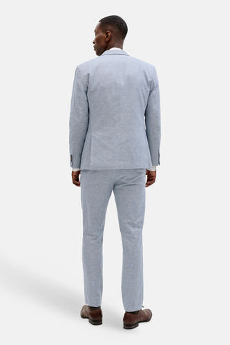 Pantalon de costume bleu de PREMIUM by JACK & JONES, vu de dos, avec des chaussures marron.
