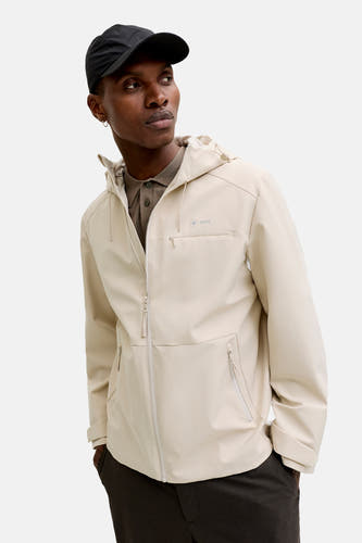 Veste courte écru de PREMIUM by JACK & JONES, avec capuche, fermeture éclair et poches.