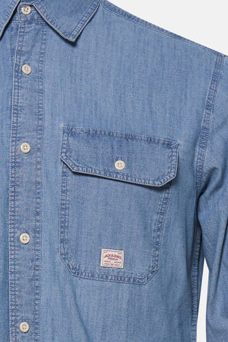 Chemise en jean bleu en denim de PREMIUM BLUE by JACK & JONES, avec poche poitrine et fermeture boutonnée.