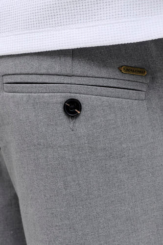 Pantalon gris de JACK & JONES JEANS INTELLIGENCE, avec poche passepoilée et logo de la marque.