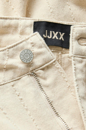 Pantalon écru de JJXX, avec une fermeture à glissière, un bouton et un motif tissé.