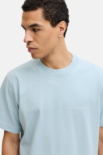 T-shirt à manches courtes bleu de PREMIUM by JACK & JONES, avec un col rond et un imprimé texte discret.