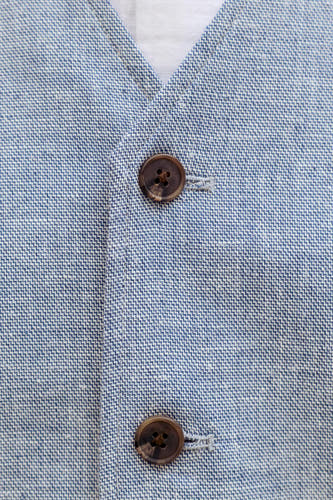 Gilet bleu de PREMIUM by JACK & JONES, avec fermeture à boutons et une subtile texture tissée.