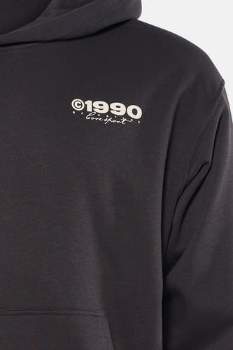 Sweatshirt à capuche gris de CORE BY JACK & JONES, avec imprimé graphique sur la poitrine.