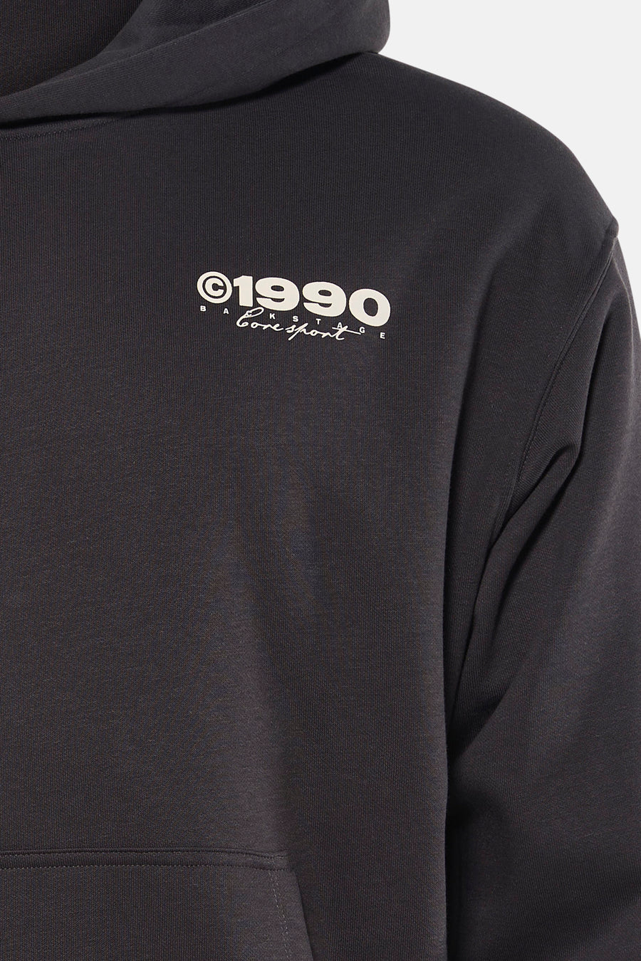 Sweatshirt à capuche gris de CORE BY JACK & JONES, avec imprimé graphique sur la poitrine.