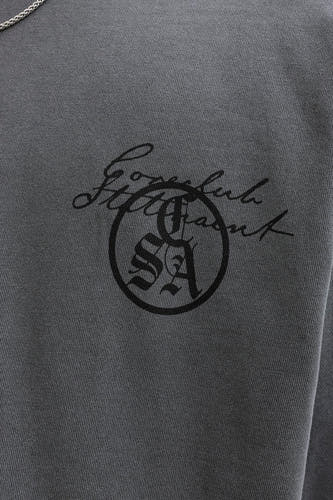 Pull noir à col rond de CORE BY JACK & JONES, avec un logo imprimé.