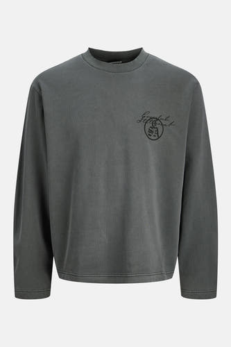 Pull noir à col rond de CORE BY JACK & JONES, avec un petit imprimé sur la poitrine.