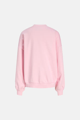 Pull rose à col rond de JJXX, tissu uni et manches longues.