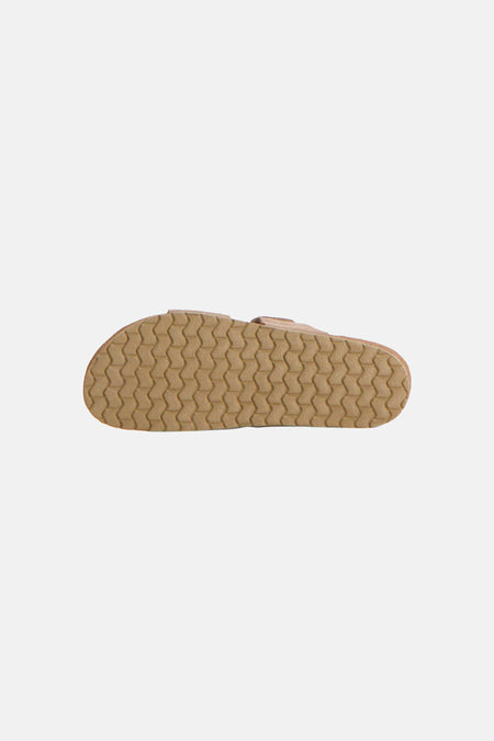Pantoufles beiges de ACCESSORIES BY JACK & JONES, avec une semelle à motif alvéolé vue de dessous.