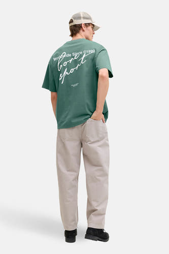 T-shirt vert à manches courtes CORE BY JACK & JONES, avec imprimé texte blanc au dos.