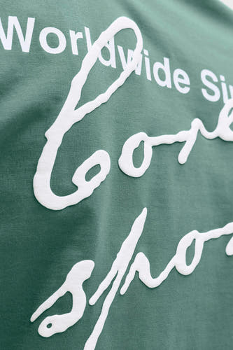 T-shirt vert de CORE BY JACK & JONES, avec impression de texte blanc en relief.