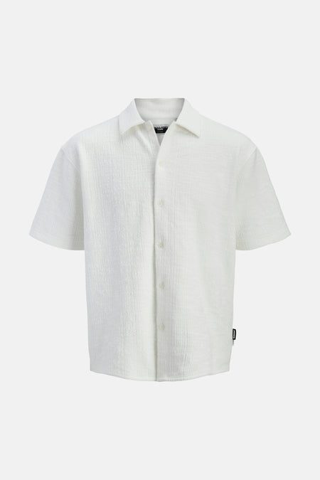 Chemise blanche à manches courtes de CORE BY JACK & JONES avec une texture subtile et une fermeture à boutons.