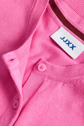 Gilet rose de JJXX, avec un col côtelé et une fermeture boutonnée sur le devant.